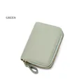 Close-up of green litchi texture leather RFID wallet with gold metal zipper detail - Green