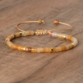 Adjustable woven bracelet with amber imperial stone beads and golden metal spacers - No.23 Yellow Aventurine