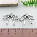 Silver plated metal bow pendant accessory for DIY jewelry necklaces and bracelets - Rounded Bowknot - Silver (21401)