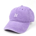 Detail of purple washed cotton baseball cap featuring white LN letter embroidery - Adjustable / Purple