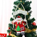 Plüsch Schneemann Anhänger mit Feliz Navidad Schild an einem Weihnachtsbaum Dekoration - Schneemann