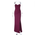 Detail view of burgundy slim-fit dress featuring a high side slit and pleated bodice - S / Burgundy