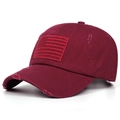 Vintage distressed maroon baseball cap featuring an embroidered American flag patch - Burgundy