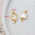 Macro view of 14k gold-filled irregular shell pendants showing 29x13mm size measurements - 13# Irregular Organic Mother of Pearl
