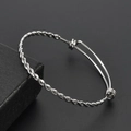 Adjustable silver twisted rope bangle in stainless steel on black gift box - Silver