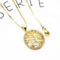 Macro detail of a gold tree of life pendant with micro-inlaid cubic zirconia on box chain - Tree and Heart-Gold (with Necklace)