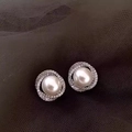 Elegant spiral silver stud earrings with round white pearl and shimmering zircon stones - Silver (B6019-1)