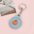 Light blue leather key ring sleeve featuring a 3D orange pumpkin charm and metal clasp - Snap Button Style - Pumpkin