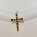 Detailed close-up of a gold-plated cross pendant featuring inlaid dark blue zircon stones - Dark Blue Zirconia/Round