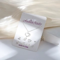Parure bijoux argentés avec collier cœur et boucles d'oreilles nœuds et cerises - Carte Blanche-Collier Cœur Argenté et 4 Paires de Boucles d'Oreilles (Cœur/Cerise/Nœud)