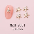 Macro shot of 9x9mm gold starfish nail charms with iridescent gems on pink base - MZH-9861 (9*9mm)