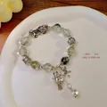 Ethnic vintage bracelet with light green beads and silver Pi Xiu and Maneki-neko charms - Transparent Green Ghost: Pixiu Fortune Cat Tibetan Silver Bracelet