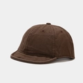 Detail view of a dark brown short brim cotton canvas baseball cap with 6-panel structure - Adjustable / Dark Brown