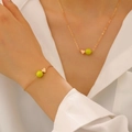 Goldenes Set aus Herzkette und Armband mit neongrünen Tennisball-Anhängern für Damen - Tennis Halskette Armband Set