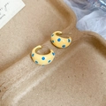 Detailed view of yellow C-shaped hoop earrings with blue polka dot resin finish - Yellow With Large Blue Polka Dots (S925 Silver Needle)
