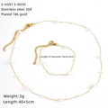 Detailed view of 18K gold plated necklace and bracelet set with white pearls on white background - Spaced Pearl Style (S-H591 S-N595)