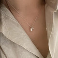 Elegant silver chain necklace with white teardrop pearl pendant worn by model - Water Drop Pearl Style (XL1949)