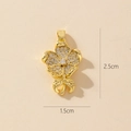 Dettaglio pendente fiore dorato con zirconi e dimensioni indicate 2,5 cm per 1,5 cm - 0372-1 Ciondolo fiore in zirconia (2,5x1,5 cm)