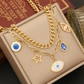 Close-up of gold double-layer bracelet with evil eye and star charms on jewelry box - 1# Necklace