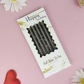 Elegant black birthday candles with gold dots in a white gift box for cake decoration - Wave Box Black Pencil Candle