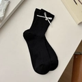 Black cotton blend mid-calf socks featuring white silk bows and heart metal pendants - One Size / Black with Bell
