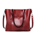 Deep red soft leather large bucket bag with shoulder strap and U-shaped pocket - Red