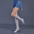 Women's knee-high socks featuring gray and white stripes in a soft knitted fabric - One Size / Grey and White Wide
