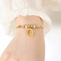 18K vergulde titanium armband met letter Q, strassteentjes en gouden kralenketting - Gouden Armband - Letter Q