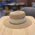 Flat top straw boater hat with ivory ribbon and metal flower badge on wooden surface - Khaki (Plum Blossom Flat Top Straw Hat)