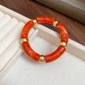 Minimalist beaded bracelet with orange marble resin tubes and gold metal spacers - Orange Red
