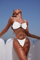 Chic two-piece white bikini featuring a gold starfish accent and high-cut bottoms - S / White