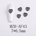 Detailed view of silver heart nail charms with black plaid pattern on white background - Silver Black Embossed Grid Heart Style (AF43)