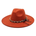 Top view of rust red wool fedora hat featuring golden chain and black leather ribbon - M (56-58cm) / Caramel color