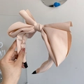 Pink large fabric bow headband with vintage minimalist style and black trim details - Pink