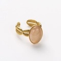 Detailed view of an 18k gold plated open ring featuring a large oval peach gemstone inlay - Adjustable Open / Khaki