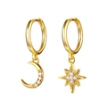 Macro detail of asymmetric gold crescent moon and North Star earrings with white zircon - Asymmetric Star Moon Gold