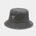 Detail of grey washed cotton bucket hat showing heart embroidery and metal eyelets - One Size / Gray
