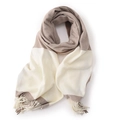 Soft beige and brown color-block plaid scarf with tassel trim on white background - Caramel color
