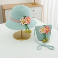 Detail showing mint green straw hat and matching bag with crochet floral decorations - 54cm (Recommended 2-10 Years) / Blue Hat + Bag Set