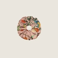 Detailed close-up of pink silk hair scrunchie with retro floral and bird jungle patterns - Style 1 - Pink Floral Bird