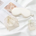 Silk sleep mask and pouch set in elegant champagne gold finish for travel use - Off White