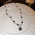 Silver-finish double-layer necklace featuring a black camellia flower pendant with crystals - Silver
