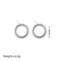 Macro detail of 15mm silver stainless steel hoop earrings with twisted rope texture and 6.5g weight - Silver Circle Stud Earrings