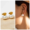 Minimalist pearl stud earrings with gold metal accents shown in close-up on model - 33# Gold Ball Oval Pearl