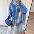 Close-up of blue and white plaid scarf with fringe styled with a matching handbag - Blue & White Plaid Fringe