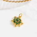 Detailed view of turtle charm with green crystals and 18k gold plated finish - Green (Turtle Style B)