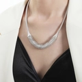 Silver spring coil pendant necklace with sleek snake chain displayed on a model - Steel Color (P1773)