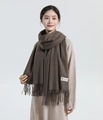 Brown thick cashmere scarf with tassels and stitched label worn by model for winter style - Wool Style / 200x70cm / Coffee