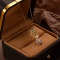 Elegante collar de acero de titanio dorado con colgante de flor de circón púrpura y perla - Collar de Círculo de Flor de Circonita Púrpura - Dorado