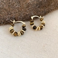 Macro shot of gold hoop earrings with brown gemstone beads on neutral fabric - Beaded Hoop Earrings - Gold - Coffee